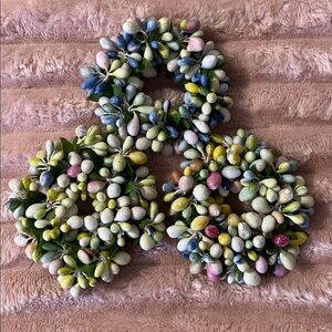 3 candle rings for taper candles. Spring colors. EC.